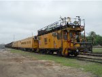 LMIX 315  1Apr2011  Support Car on the back of Loram Rail Grinder Train (RG 15) in the yard 